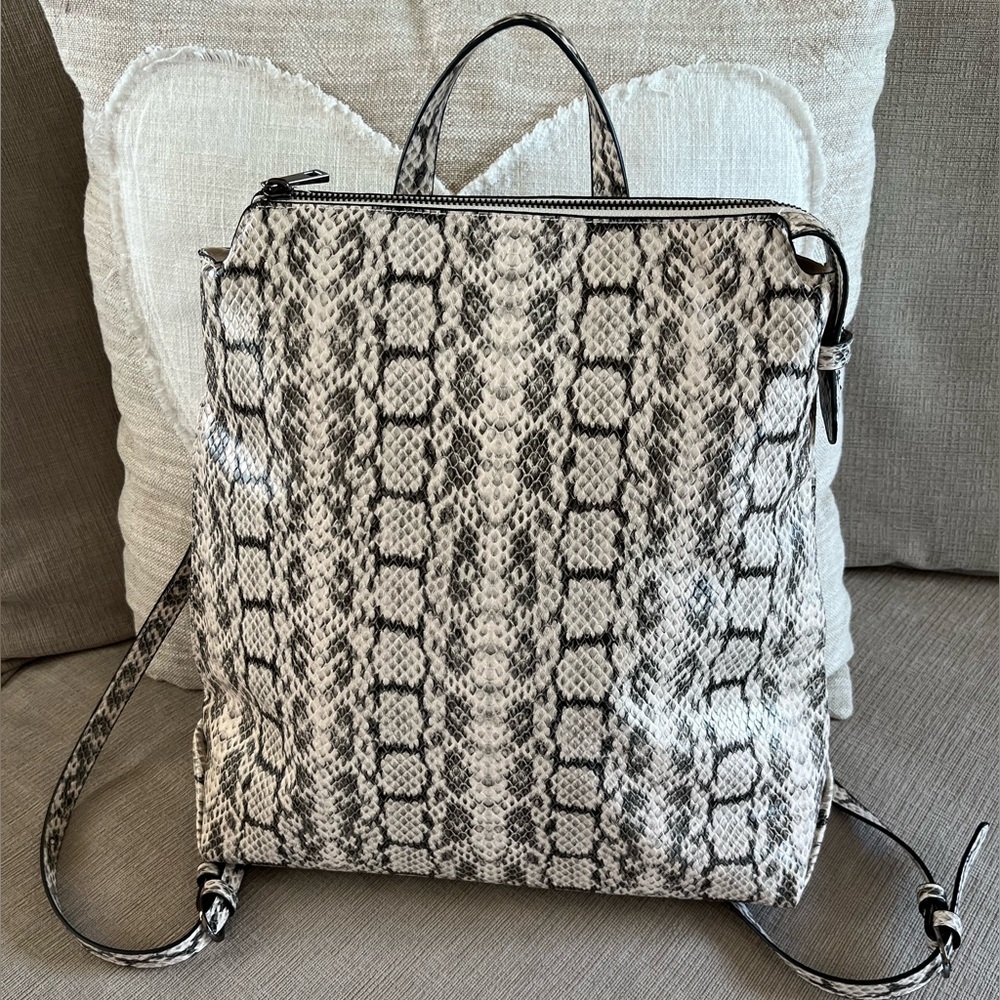 A New Day snake skin, print backpack/purse. Size approximately 13” X 14” NWOT
